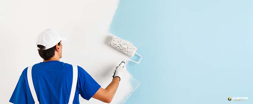 JSP-Painter painting a wall with paint roller