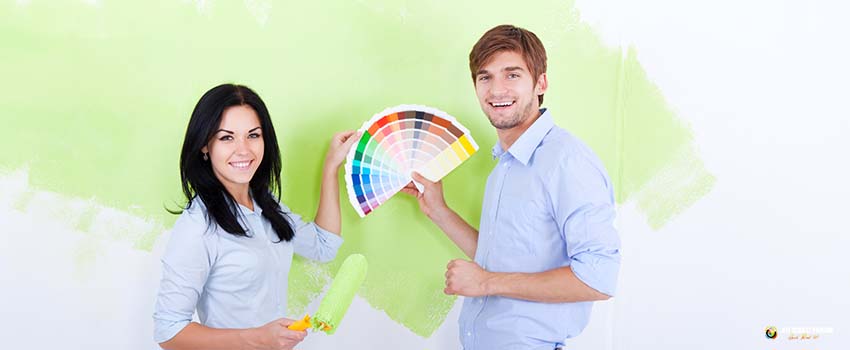 JSP-two people choosing a color for wall